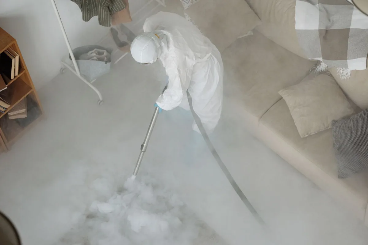 Biohazard cleanup technician in protective equipment, Pahrump, NV